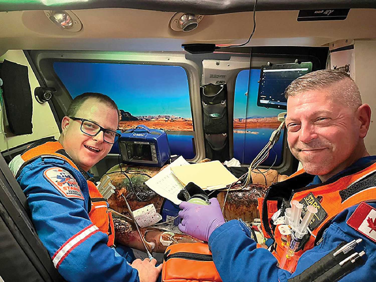 Left are, paramedic Chris Fay of STARS Air Ambulance and Kevin Easton nurse of STARS Air Ambulance on scene at the Air Medical Transport Simulation Competition in Tampa, Florida on Oct. 24 to 26.
